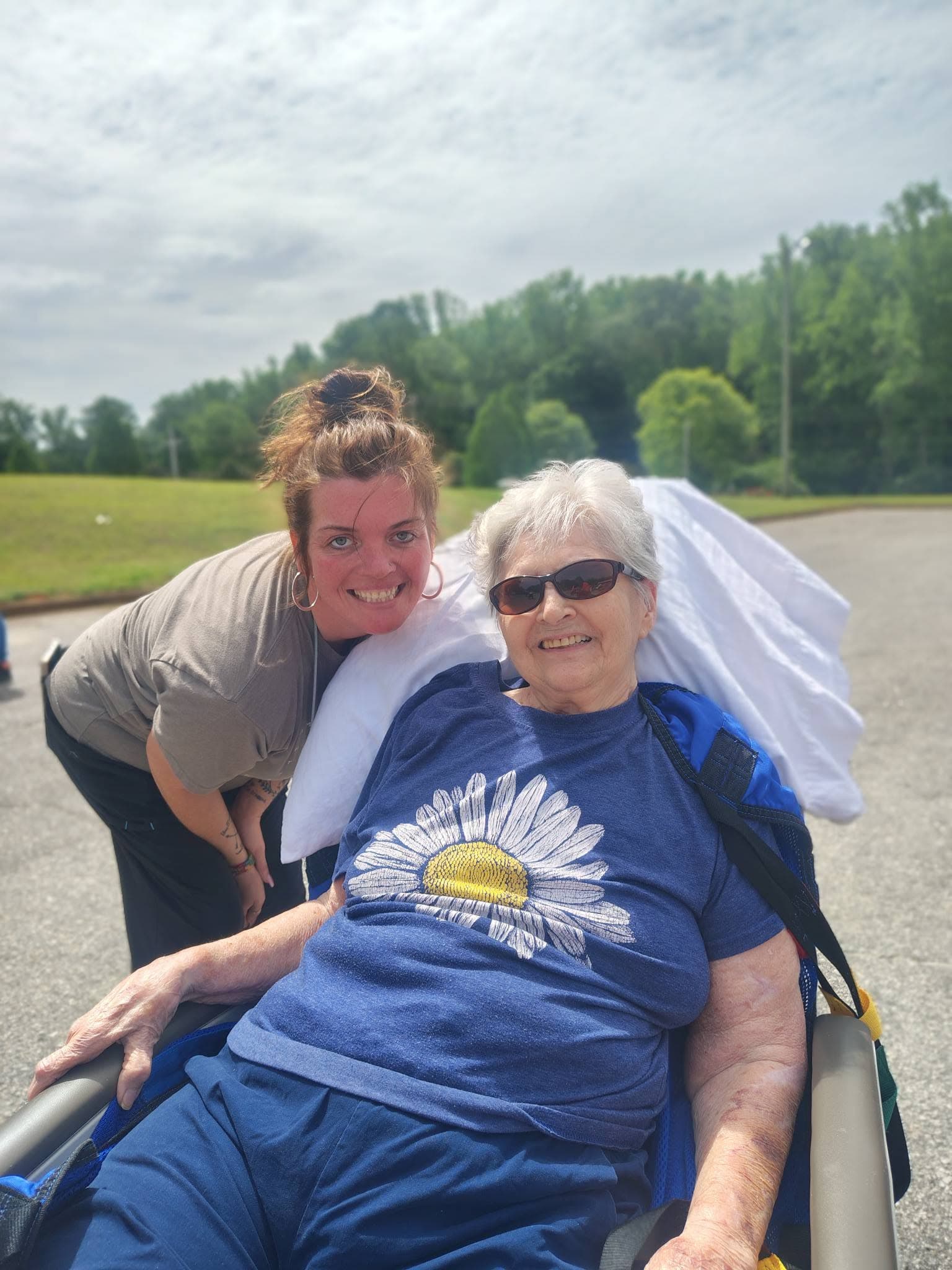 A Brookview team member and resident enjoying time outdoors